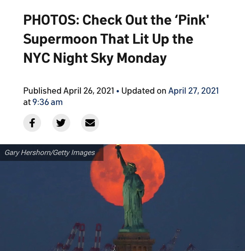 Statue of Liberty in front of an orange shimmering moon below a headline that reads "Check Out the ‘Pink' Supermoon That Lit Up the NYC Night Sky Monday"