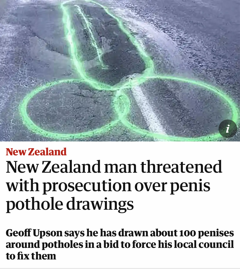 A neon green penis spray painted onto a road above a headline that reads "New Zealand man threatened with prosecution over penis pothole drawings"