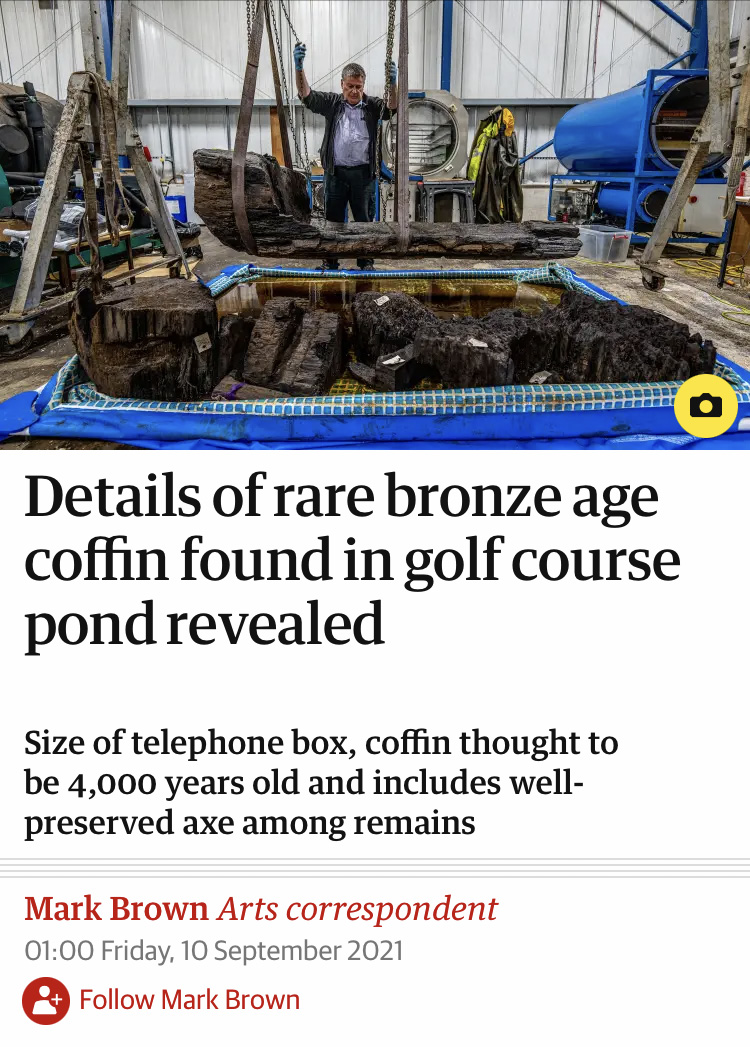Man in a shipyard hoisting an old rusted object with chains above a headline that reads "Details of rare bronze age coffin found in golf course pond revealed"