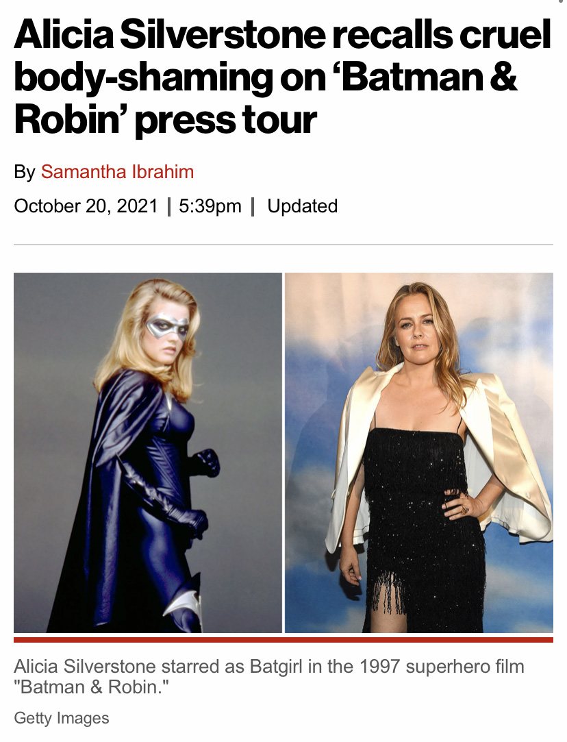 Alicia Silverstone as batgirl and posing on a red carpet below a headline that reads "Alicia Silverstone Recalls Cruel Body-Shaming on ‘Batman & Robin’ Press Tour"