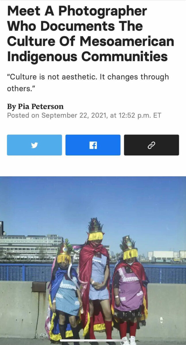 Three individuals in front of the water in masks below a headline that reads "Meet A Photographer Who Documents The Culture Of Mesoamerican Indigenous Communities