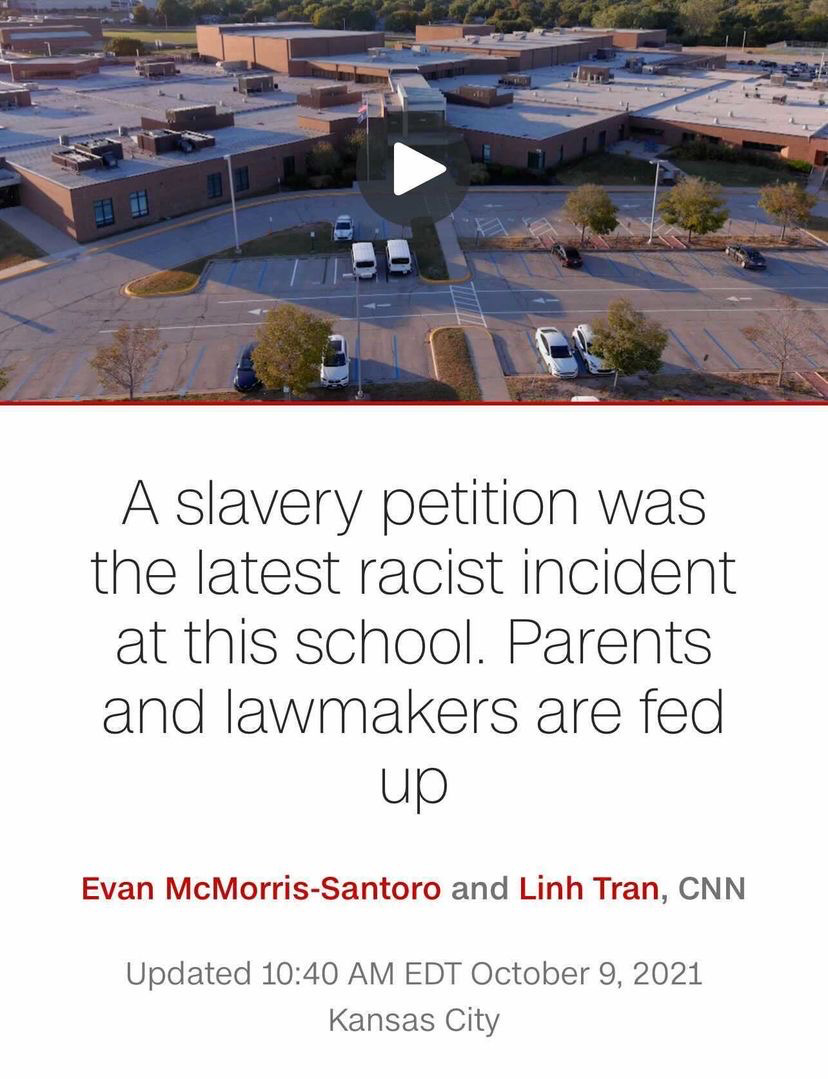 A parking lot above a headline that reads "A slavery petition was the latest racist incident at this school. Parents and lawmakers are fed up"