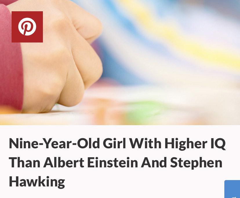 close up of a child's hand writing above a headline that reads "Nine-Year-Old Girl With Higher IQ Than Albert Einstein And Stephen Hawking"