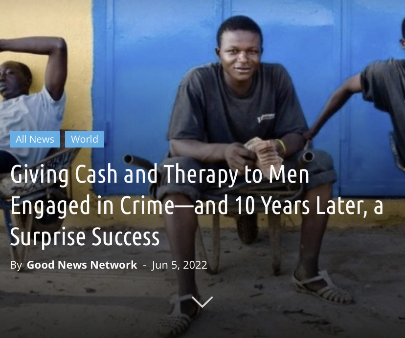 a young man sitting in front of a blue background smiling at the camera with a headline in front of him that reads "Giving Cash and Therapy to Men Engaged in Crime—and 10 Years Later, a Surprise Success"