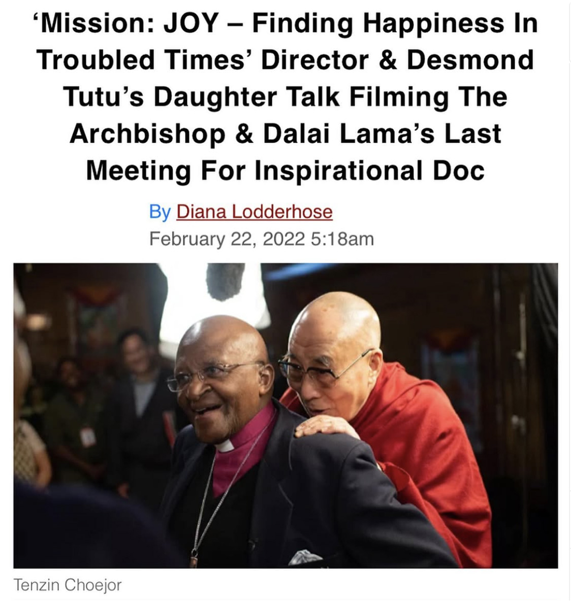 Desmond Tutu and the Dalai Lama beneath a headline that reads "Mission: JOY – Finding Happiness In Troubled Times’ Director & Desmond Tutu’s Daughter Talk Filming The Archbishop & Dalai Lama’s Last Meeting For Inspirational Doc"