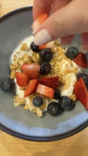 a bowl of granola and yogurt