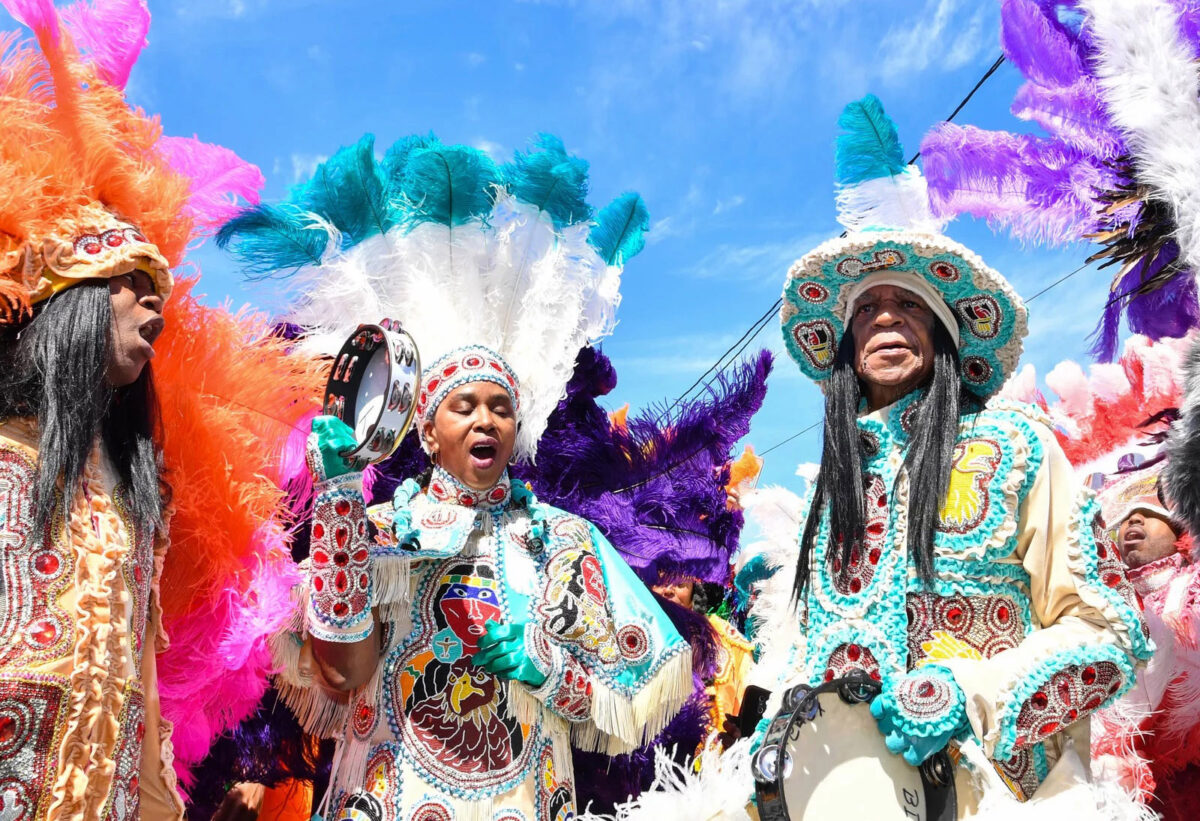 Mardi Gras Indian Big Chief Monk Boudreaux (right) and members of his Golden Eagles tribe