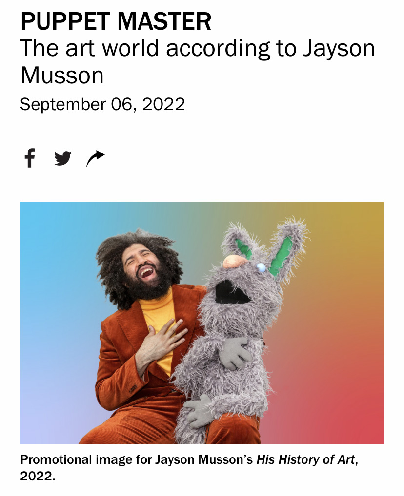 artist Jayson Musson with a large puppet on his lap both of them laughing, beneath a headline that reads "PUPPET MASTER The art world according to Jayson Musson"