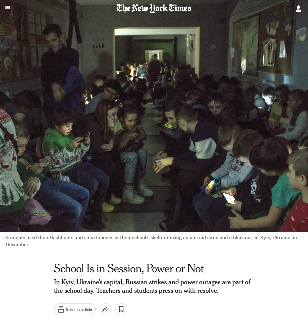 student huddled together in a school during a blackout in Ukraine above a headline that reads "School Is in Session, Power or Not"
