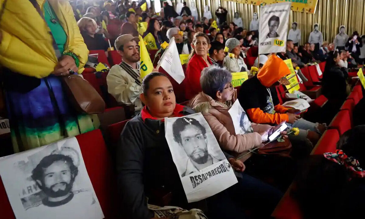 Members of the Colombian political party Unión Patriótica attend a ceremony in Bogotá, Colombia. Photograph: Mauricio Dueñas Castañeda/EPA